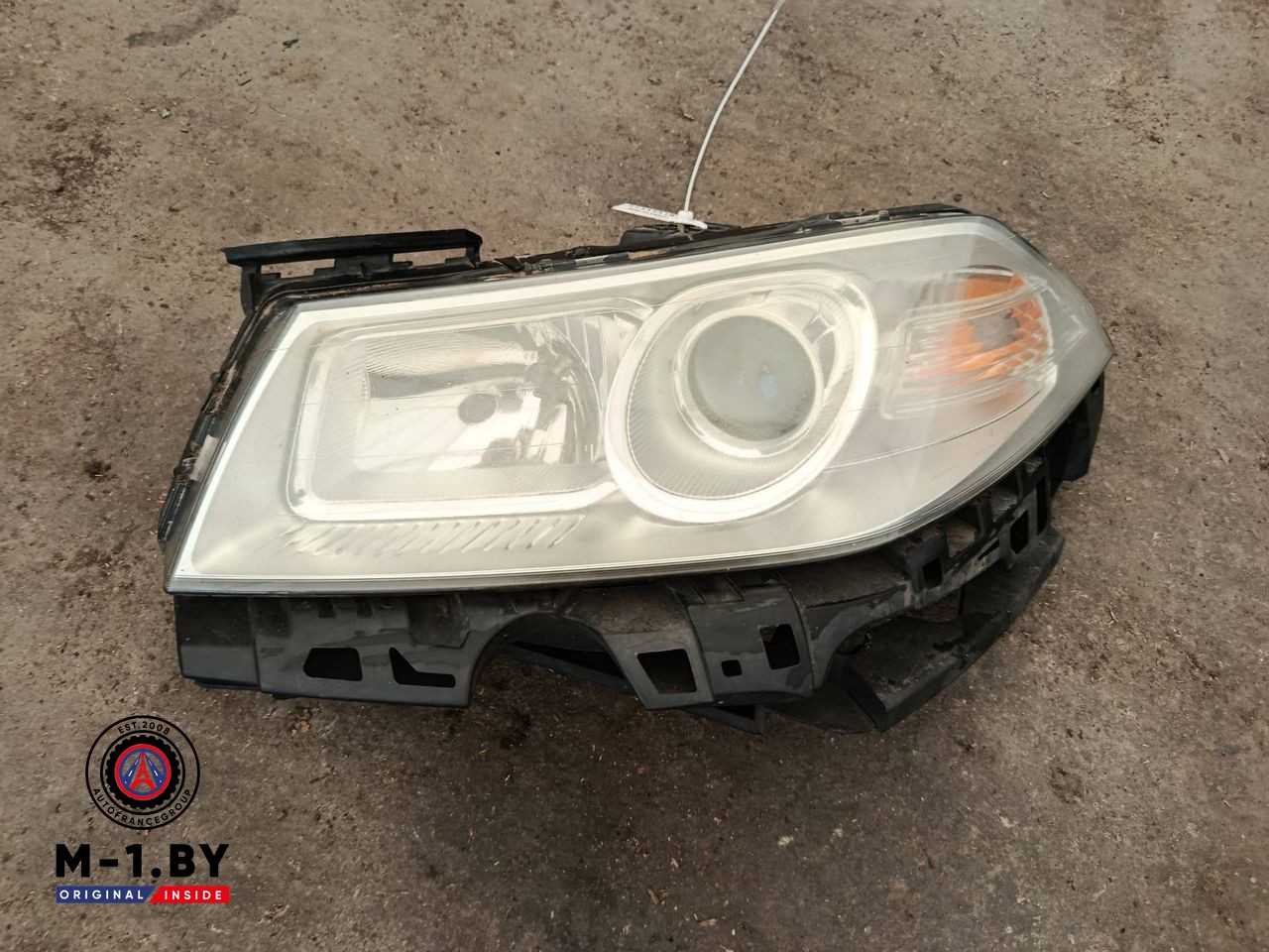 фара левая Renault Megane 2 поколение [рестайлинг] 2008, 8200412741