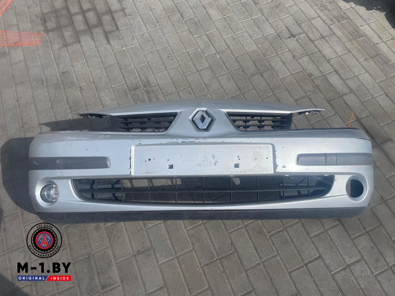 бампер передний Renault Laguna 2 поколение [рестайлинг] (2005 - 2007)