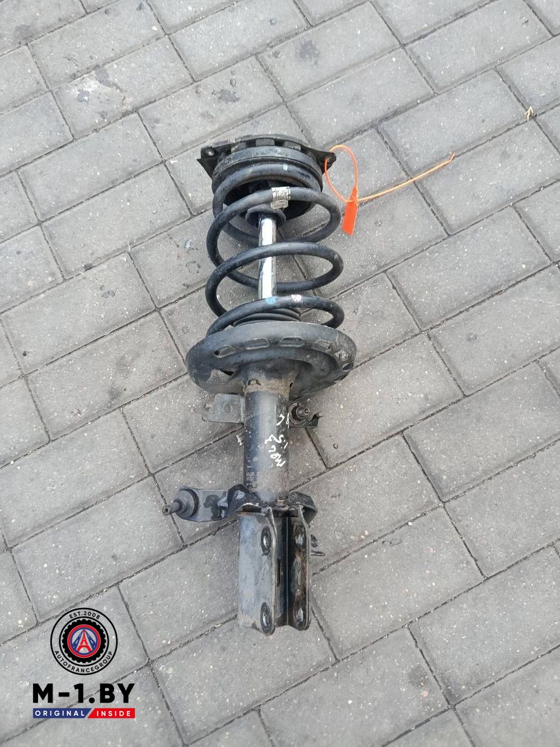 стойка передняя левая Renault Megane 3 поколение (2008 - 2014), 1.5 л., дизель