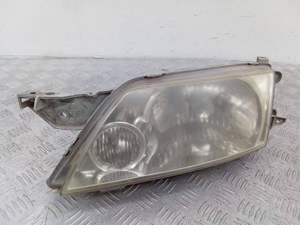 фара левая Mazda Premacy 1 поколение 2001, P1990L