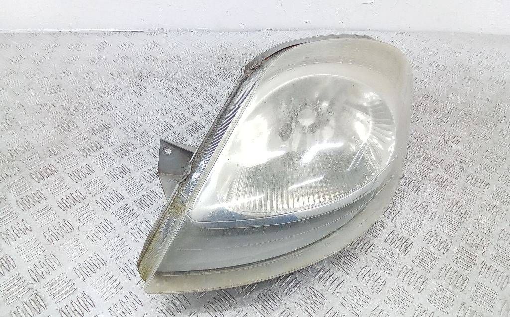 фара левая Renault Trafic 2 поколение 2006, 7700311373