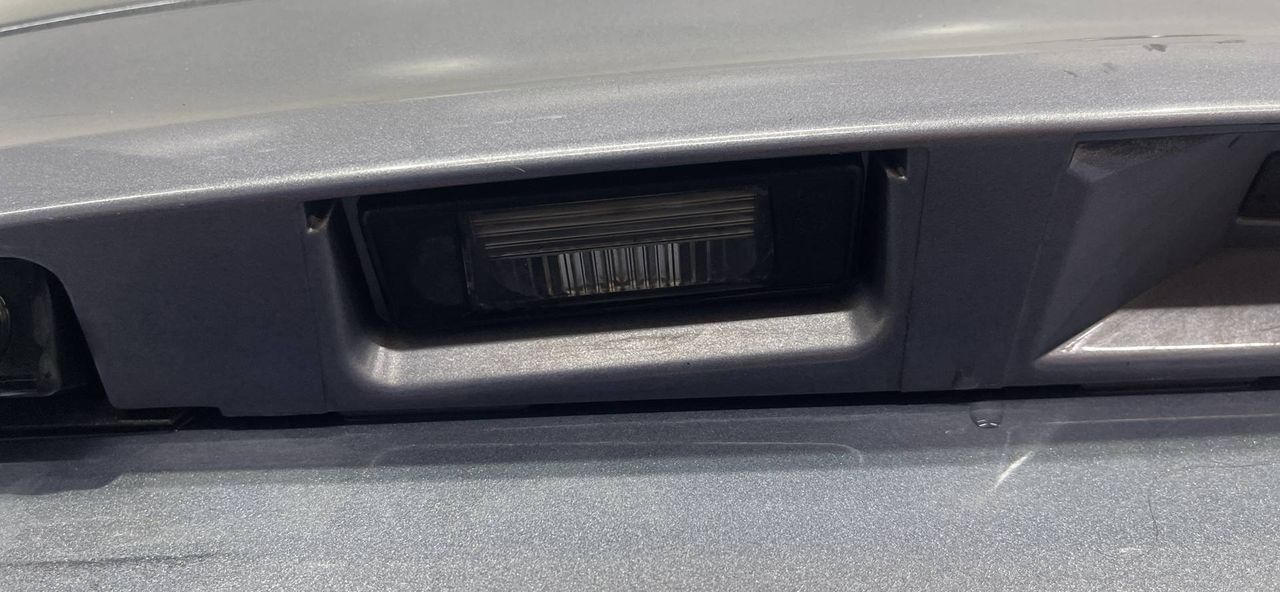 подсветка номера Nissan Qashqai+2 J10 2008