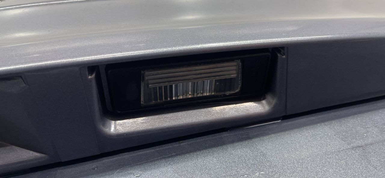 подсветка номера Nissan Qashqai+2 J10 2008
