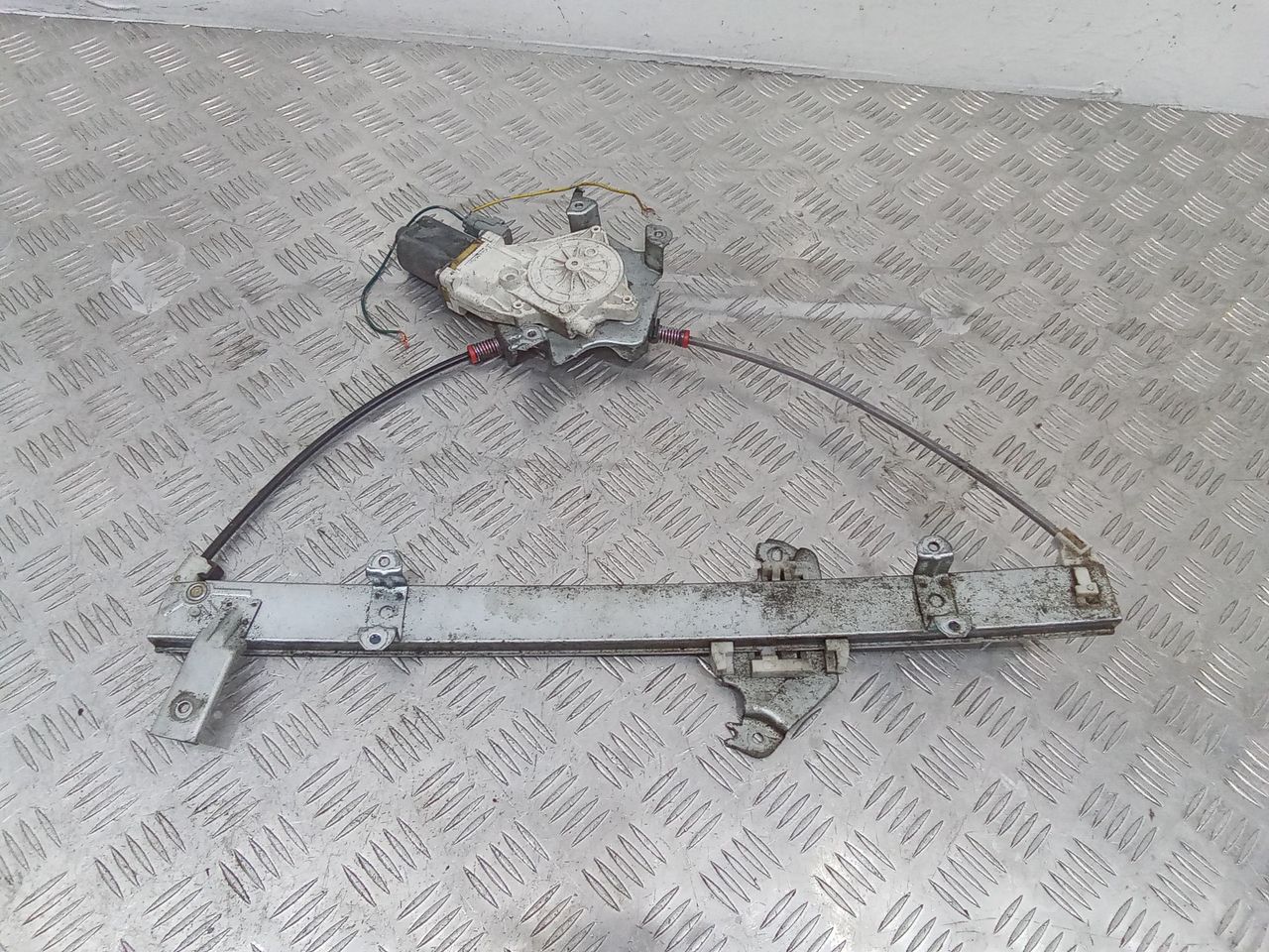 стеклоподъемник электрический передний левый Nissan Micra 3 поколение (K12) 2003, 0130822202