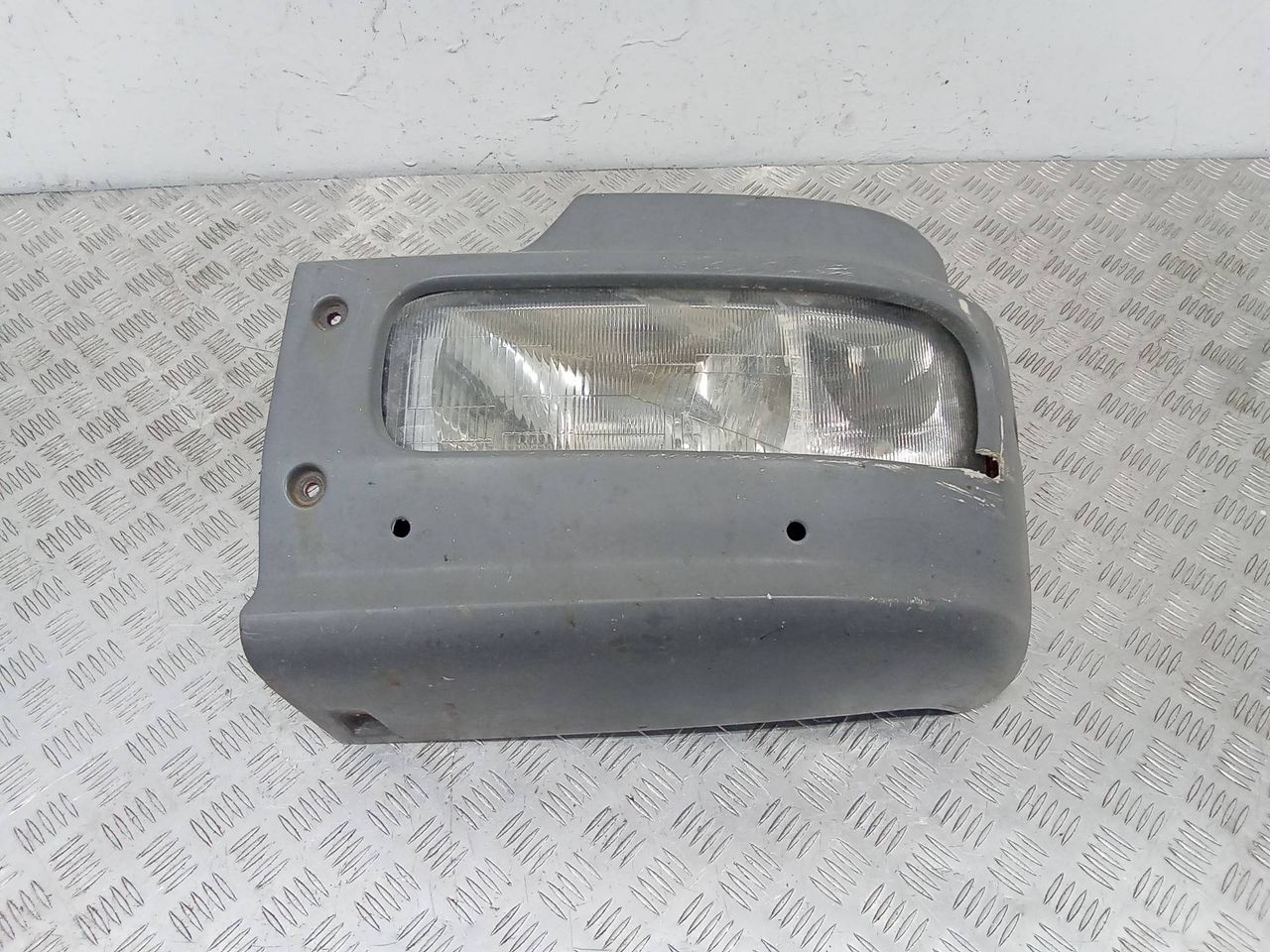 фара левая Mercedes-Benz Atego 1 поколение 2004, 9738200561