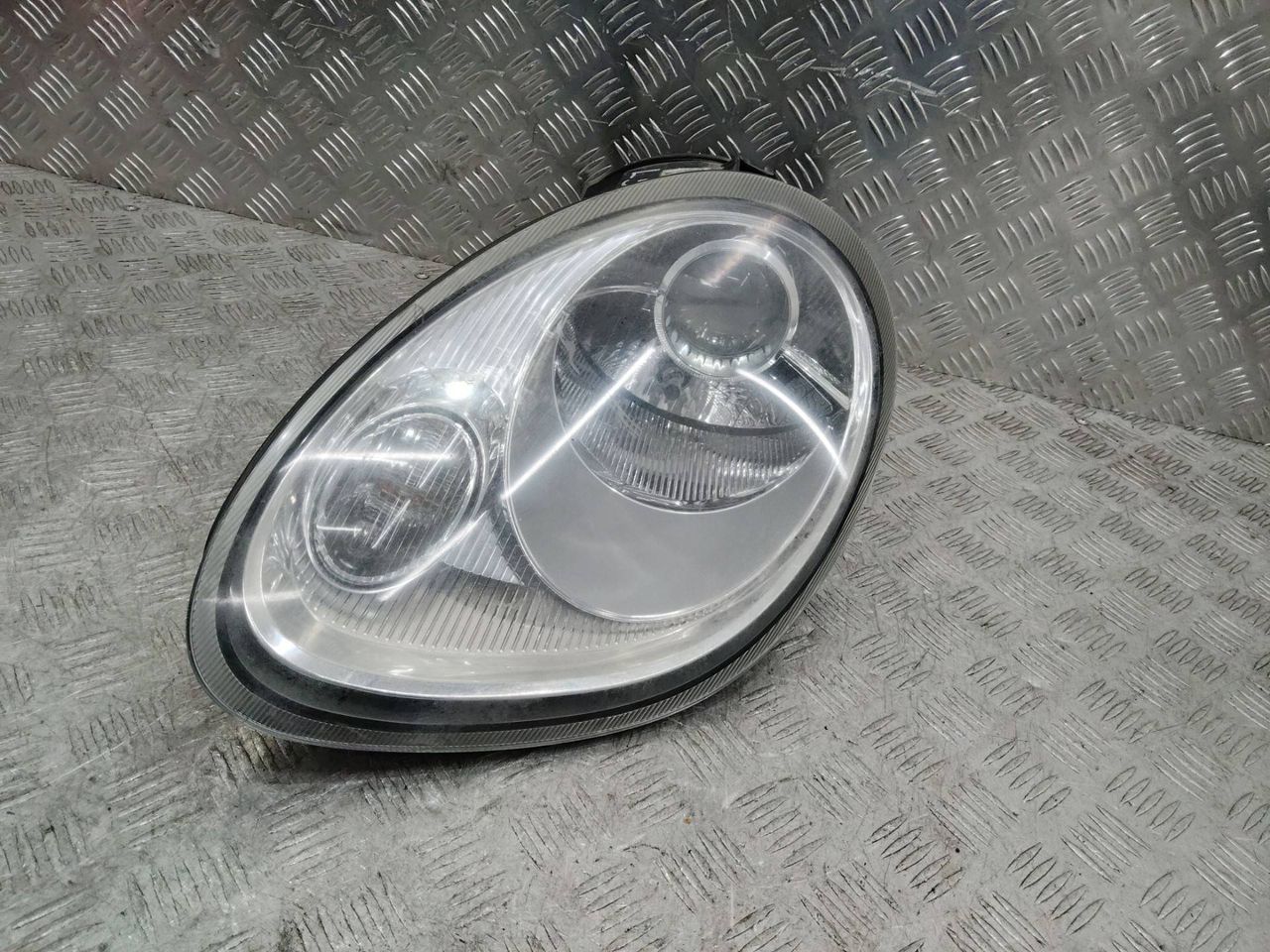 фара левая Porsche Boxster 987 2006, 98763105701