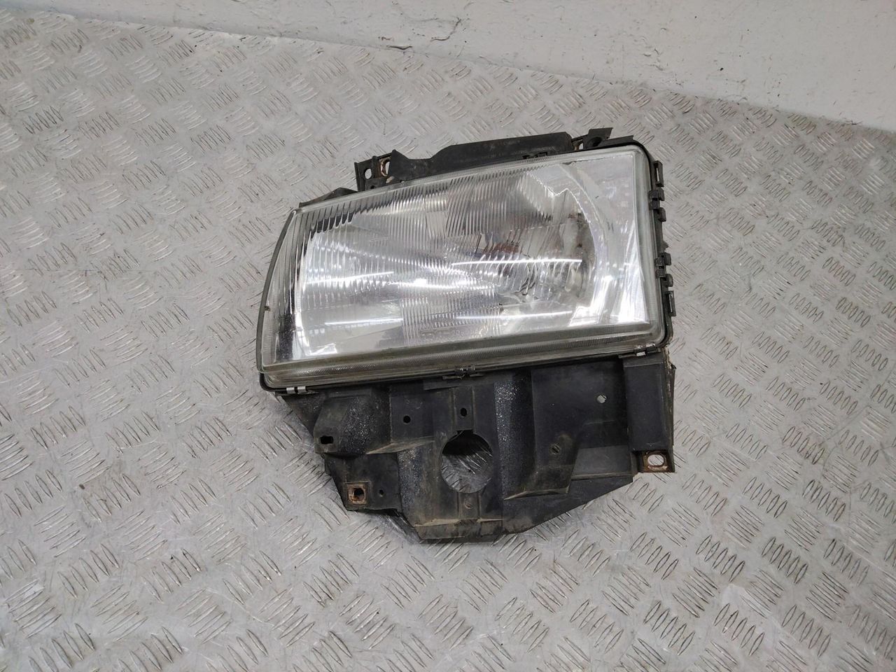 фара левая Volkswagen Transporter T4 1996, 7D1941009J
