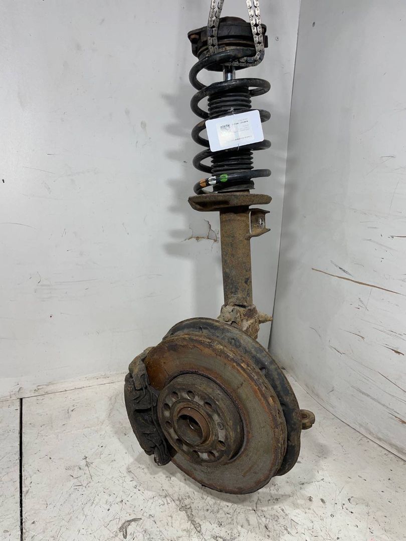 стойка передняя левая Volkswagen Caddy 3 поколение 2007, 2.0 л., дизель, 1K0413032