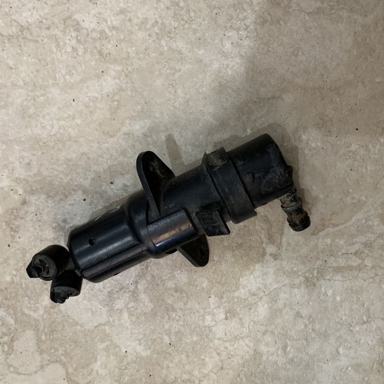 форсунка омывателя фары левая BMW 7 серия E65/E66/E67 2002, 4.4 л., бензин, АКПП, седан, 7001949
