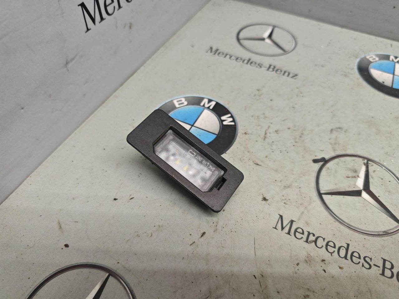 подсветка номера BMW X5 G05 [рестайлинг] 2023, 3.0 л., бензин, c4p, полный привод, 9481841