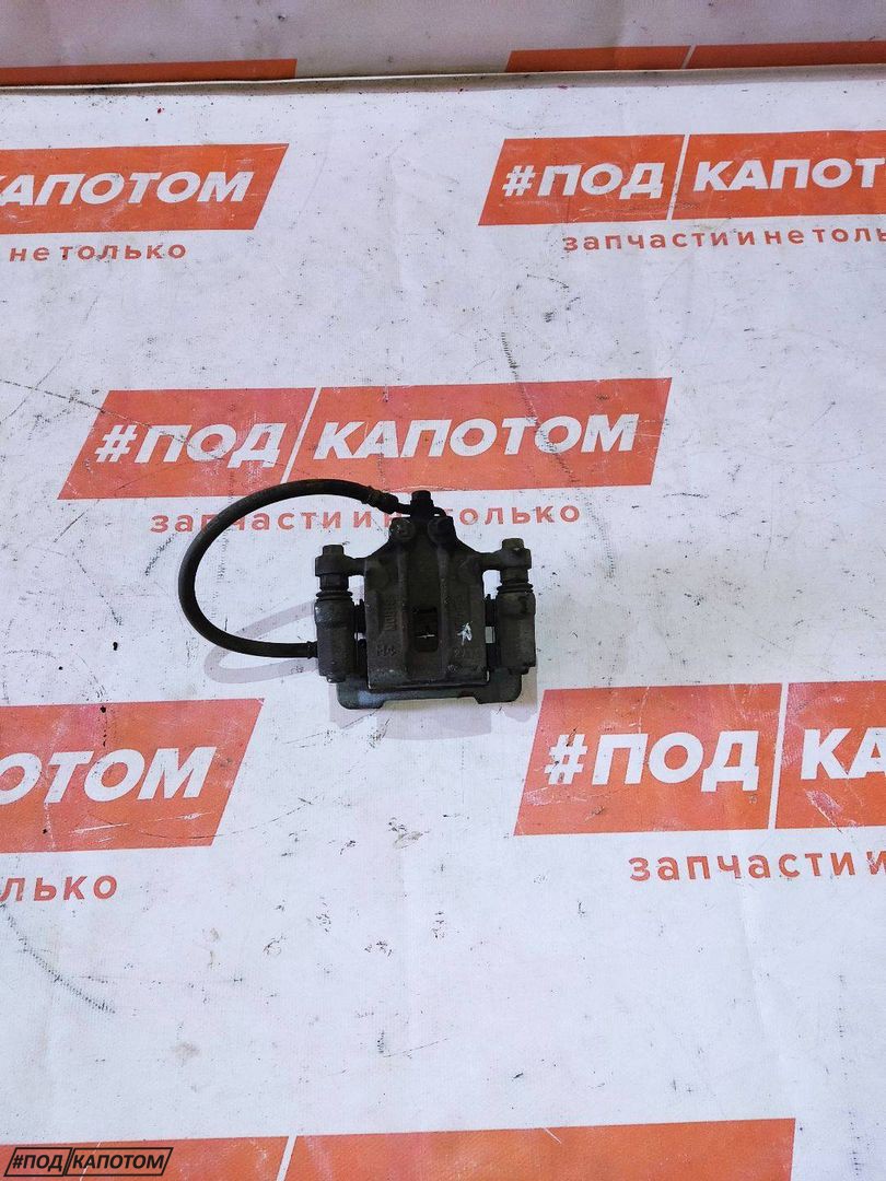 СУППОРТ зад. прав. Hyundai ix35 1 поколение 2012, 2.0 л., G4KD, бензин, АКПП, tcm (phantom black), внедорожник 5 дв., передний привод, 582302S300 - фото №1