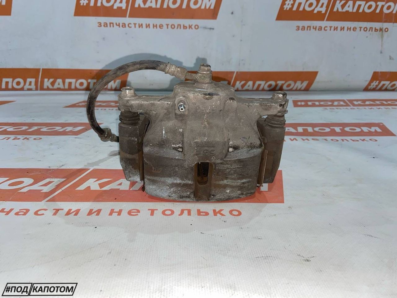 СУППОРТ перед. прав. Nissan Qashqai 2 поколение 2015, 2.0 л., MR20DD, бензин, АКПП, qab white(pearl), внедорожник 5 дв., передний привод, 410014EA0A - фото №1