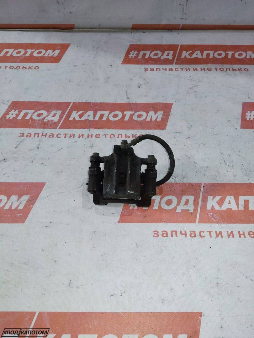 СУППОРТ зад. лев. Hyundai ix35 1 поколение 2009, 2.4 л., G4KE, бензин, АКПП, tcm (phantom black), внедорожник 5 дв., 582102S700 - фото №1