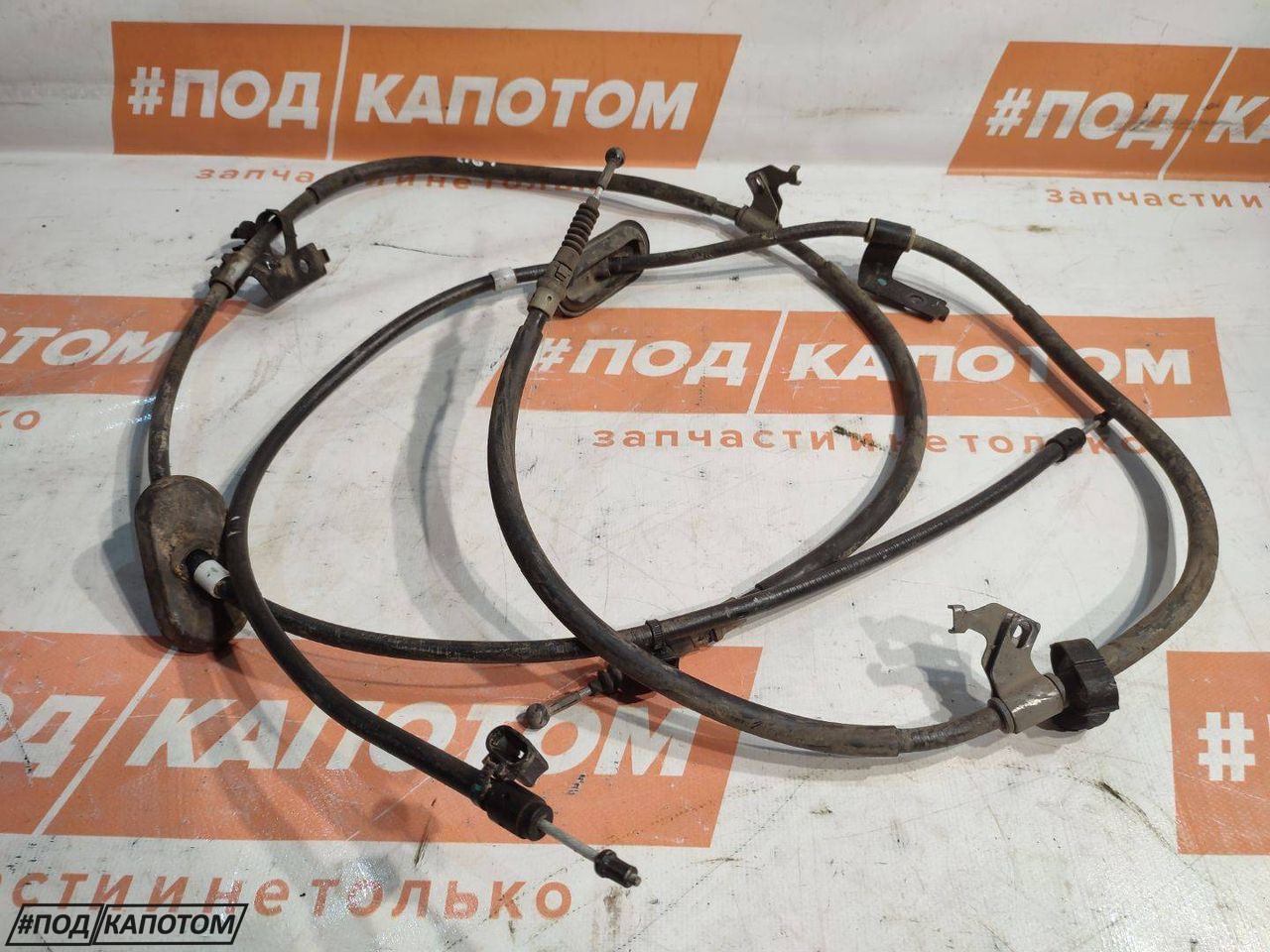 трос ручника Chevrolet Cruze 1 поколение 2012, 1.8 л., F18D4, бензин, АКПП, седан, передний привод - фото №1