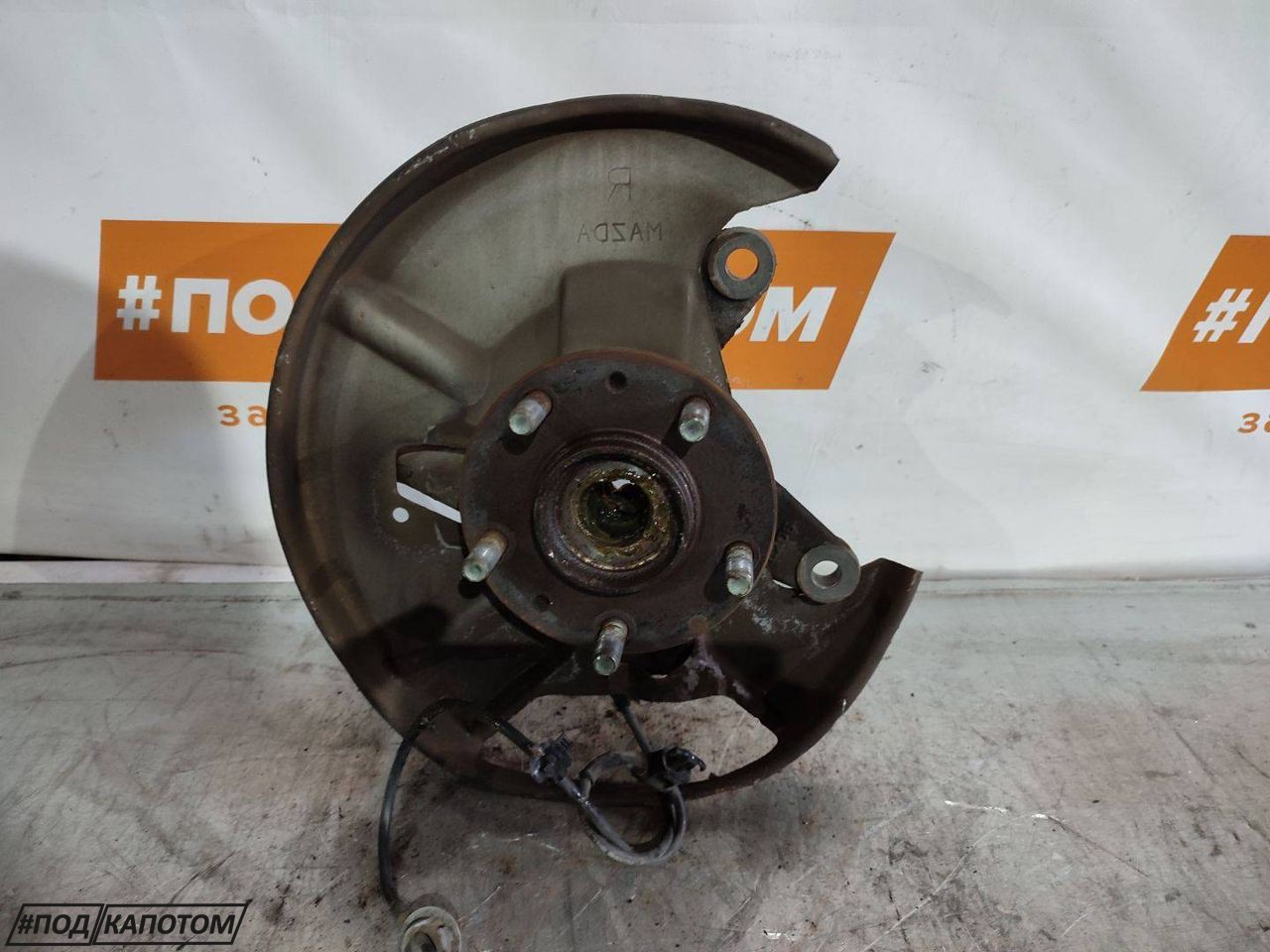 кулак поворотный правый Mazda CX-7 1 поколение 2009, 2.3 л., L3-VDT, бензин, АКПП, a3f, внедорожник 5 дв., передний привод - фото №1