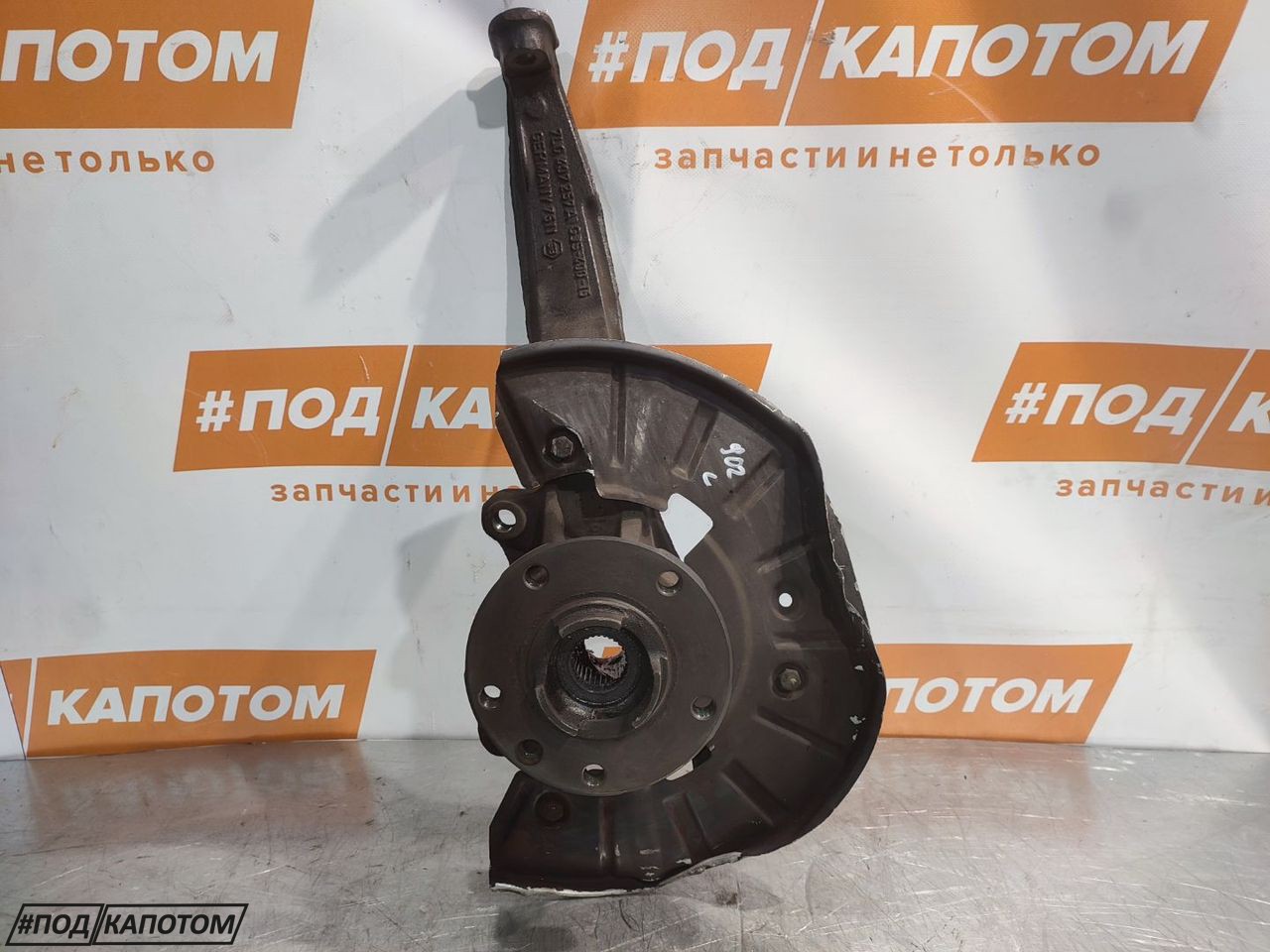 кулак поворотный левый Volkswagen Touareg 1 поколение 2006, 3.2 л., BMV, бензин, АКПП, z4 / c9z, внедорожник 5 дв., 7L0407257A - фото №1