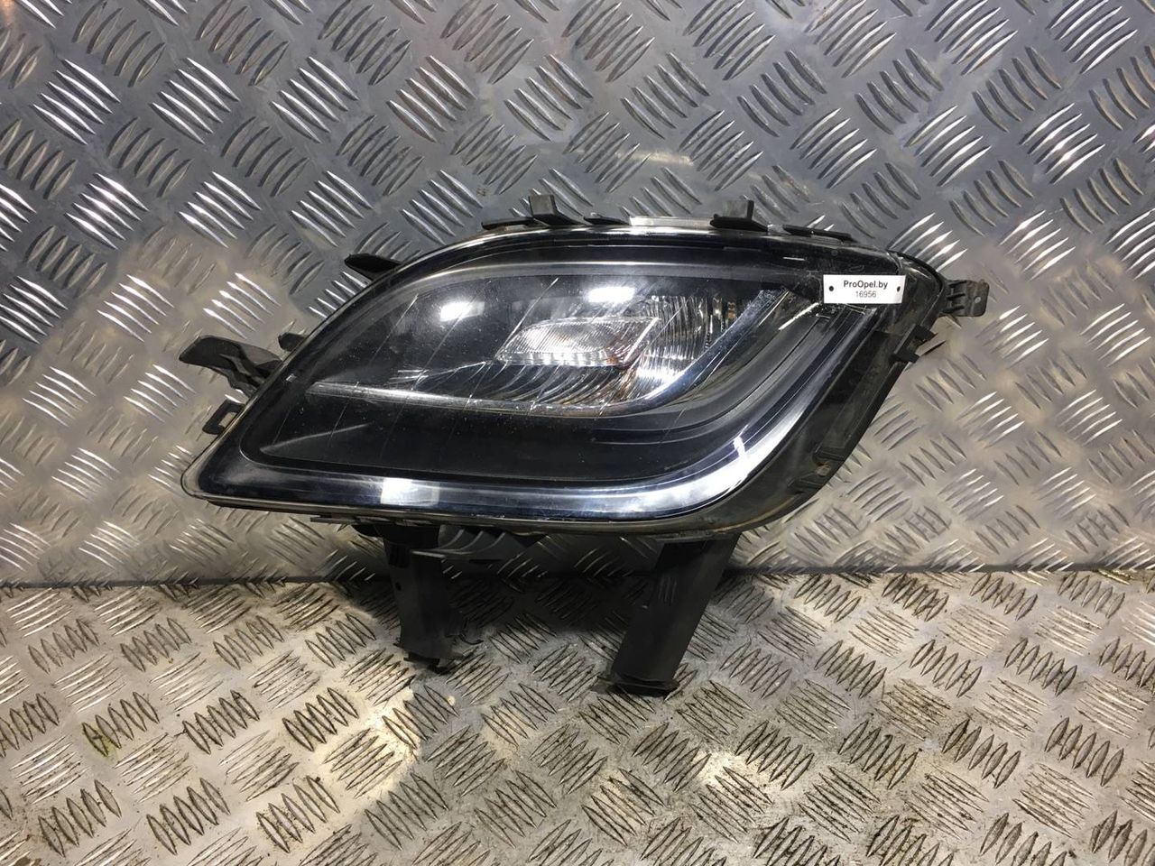 фара противотуманная левая Opel Astra J 2011, 1.3 л., A 13 DTE, дизель, 5МКПП, graphitschwarz / gar, хетчбэк 5 дв., передний привод, правый руль, 13264641 - фото №1