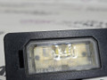 подсветка номера BMW X5 F15 2014, 3.0 л., N57 D30 A, дизель, АКПП, mineralweiss metallic (a96), полный привод, правый руль, 63267193293, 7193293 - фото №2