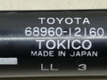 амортизатор крышки багажника (3-5 двери) Toyota Corolla 7 поколение (E100) EE101 1996, 1.3 л., 4E-FE, бензин, хетчбэк 3 дв., 68960-12160, 68950-12340 - фото №2