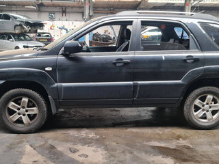 Kia Sportage 2  рест. JE 2009