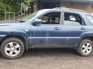 Kia Sportage 2  рест. JE 2009
