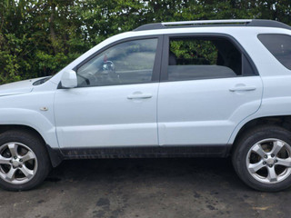 Kia Sportage 2  рест. JE 2009