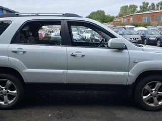 Kia Sportage 2  рест. JE 2009