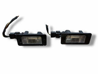 подсветка номера BMW 3 серия E90/E91/E92/E93 E90 2006, 2.0 л., i, N46 B20 A, бензин, 6МКПП, sparkling graphit / a22, седан, задний привод, правый руль, 7165646, 63267165646