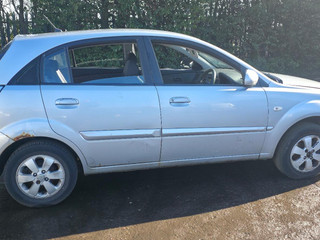 Kia Rio 2  рест. JB 2010