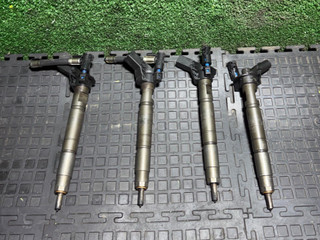 форсунка Kia Sportage 3 поколение (2010 - 2014), 2.0 л., дизель, АКПП, 338002F000