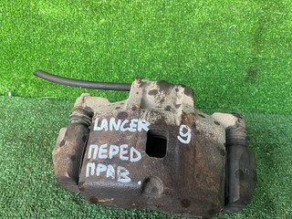 суппорт передний правый Mitsubishi Lancer 9 поколение (2003 - 2010)