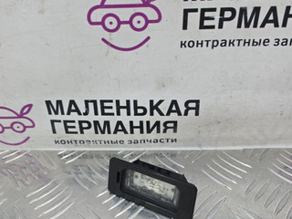 подсветка номера BMW 5 серия G30/G31 G30 2018, 2.0 л., B48 B20 A, бензин, АКПП, черный 475, седан, задний привод, правый руль, 63267410302, 7410302