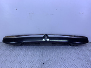 накладка подсветки номера Mitsubishi Space Star 1 поколение [рестайлинг] DG3A 2003, 1.6 л., бензин, МКПП, черный, минивэн, передний привод, MR245529