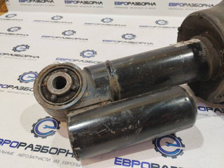 пневмостойка задняя левая