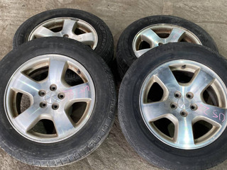 диск литой Subaru Forester 2 поколение (SG) SG 2004, 2.5 л., EJ251, бензин, МКПП, серебристый, полный привод