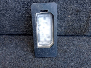 подсветка номера BMW X5 G05 2021, 3.0 л., гибрид, АКПП, c27, внедорожник 5 дв., полный привод, 9481841, 63269481841