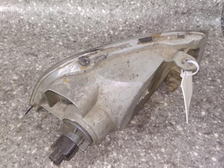 поворотник левый Mitsubishi Lancer 6 поколение 1997