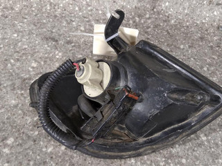 поворотник левый Nissan Sunny N14 1993