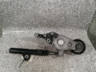 Натяжитель ремня агрегатов Volkswagen Golf 4 поколение (1997 - 2006), 038903315C, 038145284