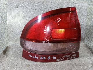фонарь задний левый Mazda 626 GE [рестайлинг] 1995