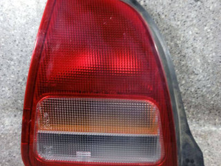 фонарь задний левый Mitsubishi Colt 5 поколение (CJO) (1995 - 2003)