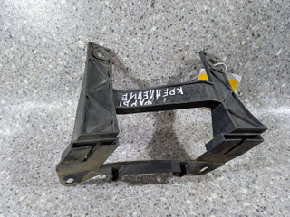 крепление фары левой Volkswagen Transporter T5 (2003 - 2009), 1301329421