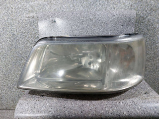 фара левая Volkswagen Transporter T5 (2003 - 2009), 7H1941015J
