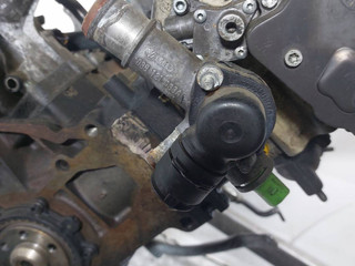фланец (тройник) системы охлаждения Volkswagen Passat B5 [рестайлинг] (2000 - 2005), 1.9 л., AVF, дизель, 038121133A