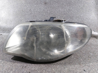 фара левая Chrysler Voyager 4 поколение [рестайлинг] (2004 - 2007), 04857831ACI