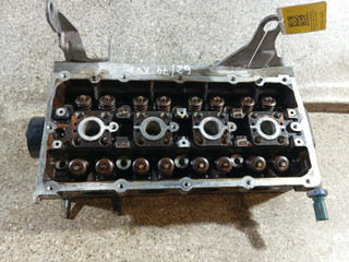 головка блока цилиндров Volkswagen Golf 4 поколение (1997 - 2006), 1.4 л., i, AXP, бензин, 5МКПП, 036103373AS