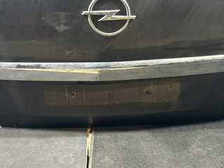 накладка подсветки номера Opel Zafira 2 поколение (B) [рестайлинг] (2008 - 2014)