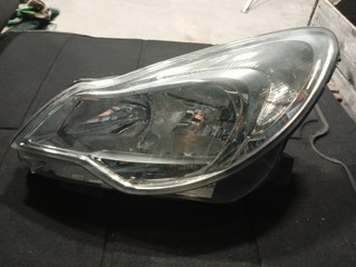 фара левая Opel Corsa D [рестайлинг] (2010 - 2011), 13392705