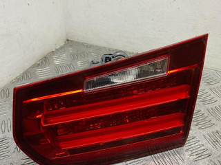 фонарь крышки багажника правый BMW 3 серия F30/F31/F34 [рестайлинг] F30 2015, 2.0 л., N47 D20 C, дизель, МКПП, estoril blau (b45), седан, полный привод, правый руль, 63217371112, 7371112