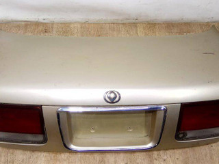 фонарь крышки багажника левый Mazda 626 3 поколение [рестайлинг] 1995, бежевый, седан